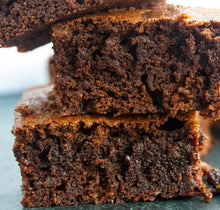 Load image into Gallery viewer, brownies stacked on top of each other
